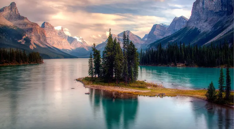 Spirit Island on Maligne Lake under golden late-day light